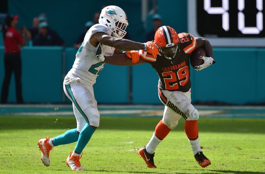 Sep 25, 2016; Miami Gardens, FL, USA; Cleveland Browns running back Duke Johnson (29) stiff arms Miami Dolphins cornerback Xavien Howard (25) during the second half at Hard Rock Stadium.The Miami Dolphins defeat the Cleveland Browns 34-20 in overtime. Mandatory Credit: Jasen Vinlove-USA TODAY Sports