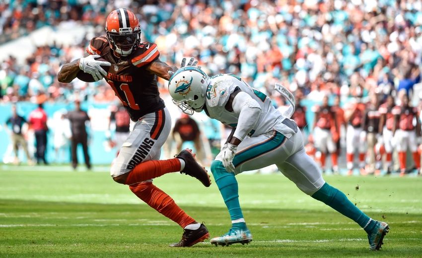 Sep 25, 2016; Miami Gardens, FL, USA; Cleveland Browns quarterback Terrelle Pryor (11) is tackled by Miami Dolphins free safety Reshad Jones (20) during the second half at Hard Rock Stadium. Mandatory Credit: Steve Mitchell-USA TODAY Sports