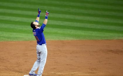 Nov 2, 2016; Cleveland, OH, USA; Chicago Cubs outfielder Ben Zobrist (18) celebrates after hitting a RBI double against the Cleveland Indians in the 10th inning in game seven of the 2016 World Series at Progressive Field. Mandatory Credit: Charles LeClaire-USA TODAY Sports