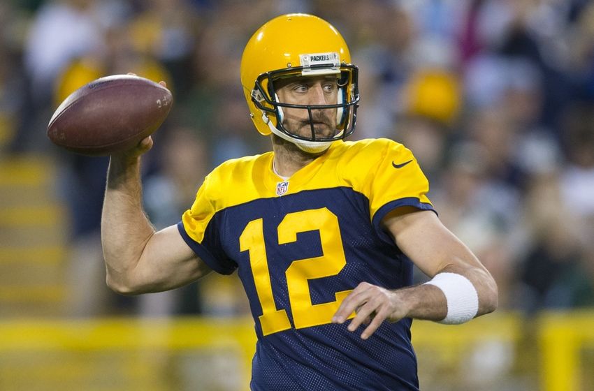 Oct 16, 2016; Green Bay, WI, USA; Green Bay Packers quarterback Aaron Rodgers (12) throws a pass during the fourth quarter against the Dallas Cowboys at Lambeau Field. The Cowboys won 30-16. Mandatory Credit: Jeff Hanisch-USA TODAY Sports
