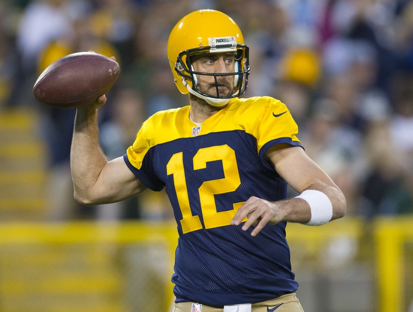 Oct 16, 2016; Green Bay, WI, USA; Green Bay Packers quarterback Aaron Rodgers (12) throws a pass during the fourth quarter against the Dallas Cowboys at Lambeau Field. The Cowboys won 30-16. Mandatory Credit: Jeff Hanisch-USA TODAY Sports