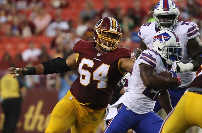 Aug 26, 2016; Landover, MD, USA; Washington Redskins defensive end Kedric Golston (64) attempts to tackle Buffalo Bills running back Reggie Bush (22) at FedEx Field. Mandatory Credit: Geoff Burke-USA TODAY Sports