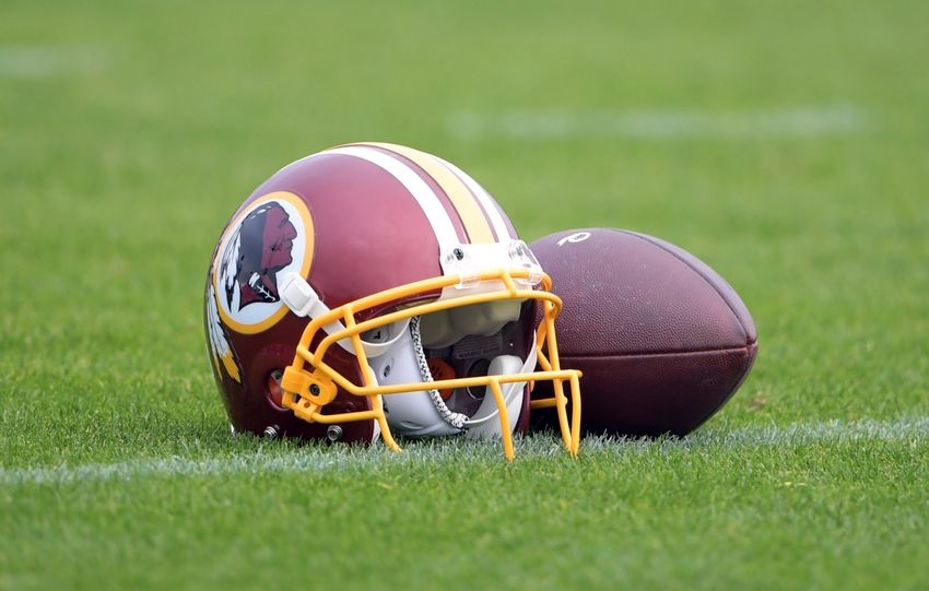 Oct 28, 2016; London United Kingdom; Washington Redskins helmet and football at practice at the Twyford Avenue Sports Ground in preparation for game 17 of the NFL International Series against the Cincinnati Bengals. Mandatory Credit: Kirby Lee-USA TODAY Sports