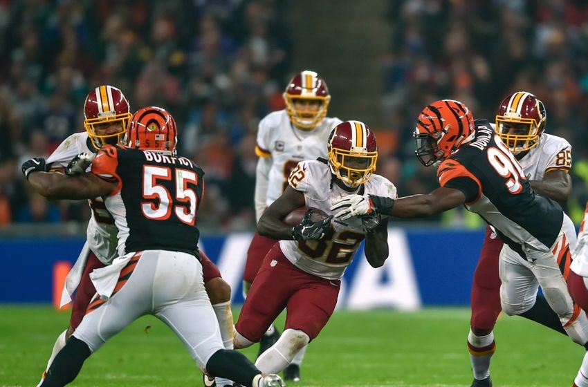 Oct 30, 2016; London, United Kingdom; Washington Redskins running back Robert Kelley (32) runs against the Cincinnati Bengals defense during the third quarter at Wembley Stadium. Mandatory Credit: Steve Flynn-USA TODAY Sports