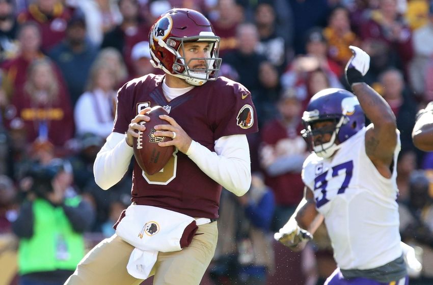 Nov 13, 2016; Landover, MD, USA; Washington Redskins quarterback Kirk Cousins (8) prepares to throw the ball as Minnesota Vikings defensive end Everson Griffen (97) chases in the first quarter at FedEx Field. The Redskins won 26-20. Mandatory Credit: Geoff Burke-USA TODAY Sports