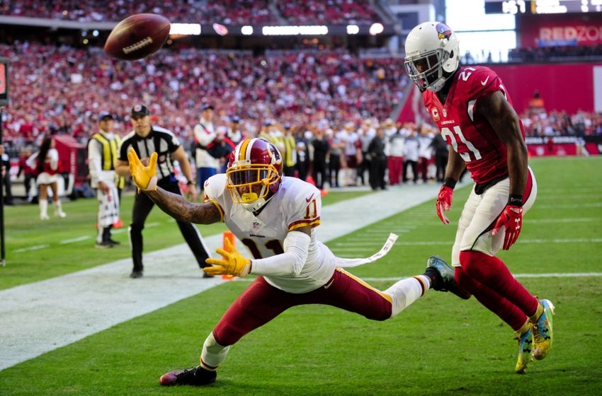 Dec 4, 2016; Glendale, AZ, USA; Washington Redskins wide receiver DeSean Jackson (11) drops a pass as Arizona Cardinals cornerback Patrick Peterson (21) defends during the first half at University of Phoenix Stadium. Mandatory Credit: Matt Kartozian-USA TODAY Sports