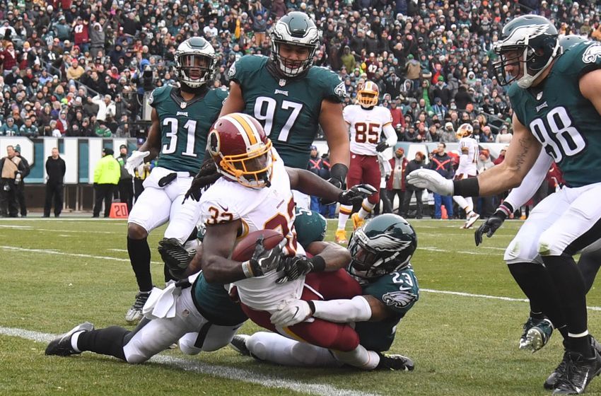 Dec 11, 2016; Philadelphia, PA, USA; Washington Redskins running back Robert Kelley (32) carries for a touchdown as Philadelphia Eagles safety Rodney McLeod (23) tackles in the second quarter at Lincoln Financial Field. Mandatory Credit: James Lang-USA TODAY Sports