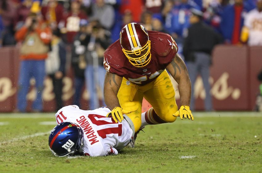 Jan 1, 2017; Landover, MD, USA; New York Giants quarterback Eli Manning (10) is sacked by Washington Redskins defensive lineman Cullen Jenkins (73) in the fourth quarter at FedEx Field. The Giants won 19-10. Mandatory Credit: Geoff Burke-USA TODAY Sports
