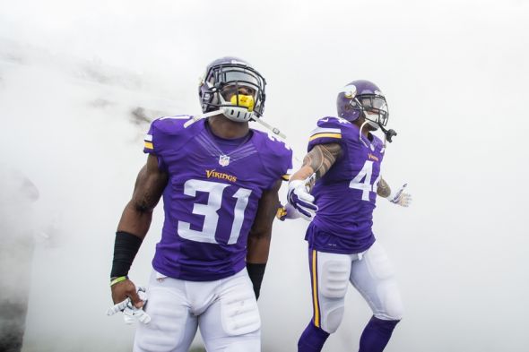 Dec 20, 2015; Minneapolis, MN, USA; Minnesota Vikings running back Jerick McKinnon (31) and running back Matt Asiata (44) run onto the field before the game against the Chicago Bears at TCF Bank Stadium. Mandatory Credit: Brad Rempel-USA TODAY Sports