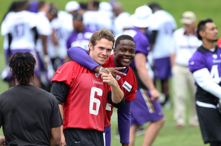 Jun 15, 2016; Minneapolis, MN, USA; Minnesota Vikings quarterback Teddy Bridgewater (5) and quarterback Taylor Heinicke (6) react after practice during mini camp. Mandatory Credit: Brad Rempel-USA TODAY Sports