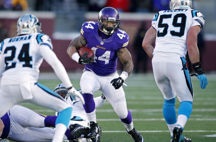 Nov 30, 2014; Minneapolis, MN, USA; Minnesota Vikings running back Matt Asiata (44) rushes against the Carolina Panthers for 3 yards in the fourth quarter at TCF Bank Stadium. The Vikings won 31-13. Mandatory Credit: Bruce Kluckhohn-USA TODAY Sports