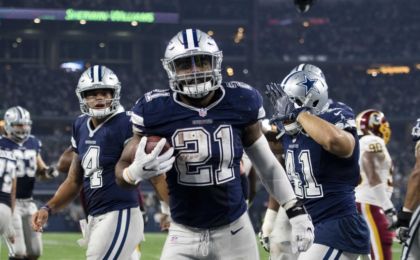 Nov 24, 2016; Arlington, TX, USA; Dallas Cowboys running back Ezekiel Elliott (21) scores a touchdown against the Washington Redskins during the second half at AT&T Stadium. The Cowboys defeat the Redskins 31-26. Mandatory Credit: Jerome Miron-USA TODAY Sports