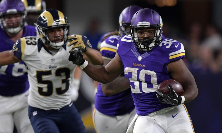 Sep 1, 2016; Minneapolis, MN, USA; Minnesota Vikings running back C.J. Ham (30) carries the ball against the Los Angeles Rams during a NFL game at U.S. Bank Stadium. Mandatory Credit: Kirby Lee-USA TODAY Sports