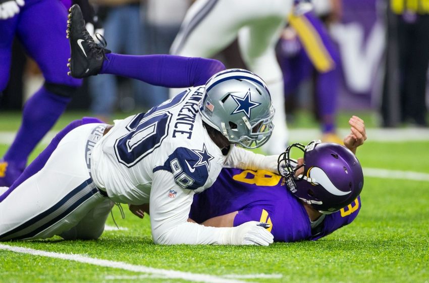 Dec 1, 2016; Minneapolis, MN, USA; Dallas Cowboys defensive lineman DeMarcus Lawrence (90) tackles Minnesota Vikings quarterback Sam Bradford (8) in the first quarter at U.S. Bank Stadium. Mandatory Credit: Brad Rempel-USA TODAY Sports