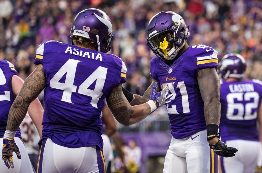 Jan 1, 2017; Minneapolis, MN, USA; Minnesota Vikings running back Jerick McKinnon (21) celebrates his touchdown with running back Matt Asiata (44) during the fourth quarter at U.S. Bank Stadium. Mandatory Credit: Brace Hemmelgarn-USA TODAY Sports
