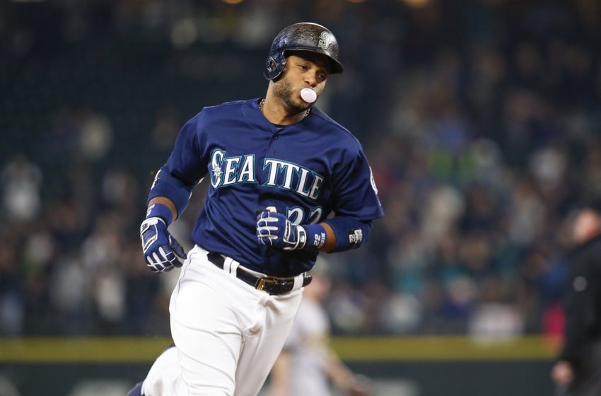 Sep 30, 2016; Seattle, WA, USA; Seattle Mariners second baseman Robinson Cano (22) runs the bases after hitting a two-run homer against the Oakland Athletics during the first inning at Safeco Field. Mandatory Credit: Joe Nicholson-USA TODAY Sports