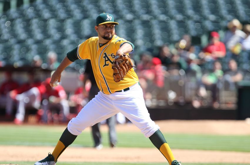 Sep 2, 2015; Oakland, CA, USA; Oakland Athletics relief pitcher Edward Mujica (49) pitches the ball against the Los Angeles Angels during the sixth inning at O.co Coliseum. Mandatory Credit: Kelley L Cox-USA TODAY Sports
