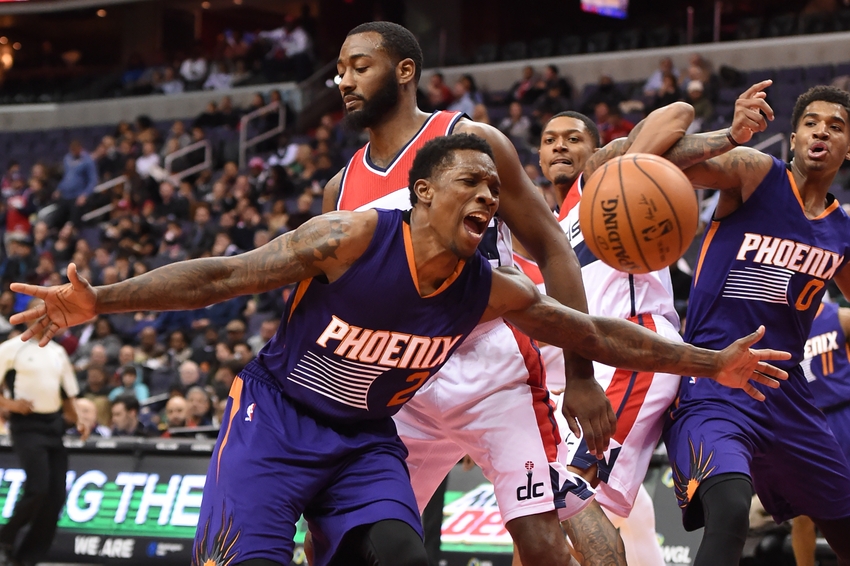 Nov 21, 2016; Washington, DC, USA; Phoenix Suns guard Eric Bledsoe (2) reacts after loosing control of the ball as Washington Wizards guard John Wall (2) defends during the third quarter at Verizon Center. Washington Wizards defeated Phoenix Suns 106-101. Mandatory Credit: Tommy Gilligan-USA TODAY Sports