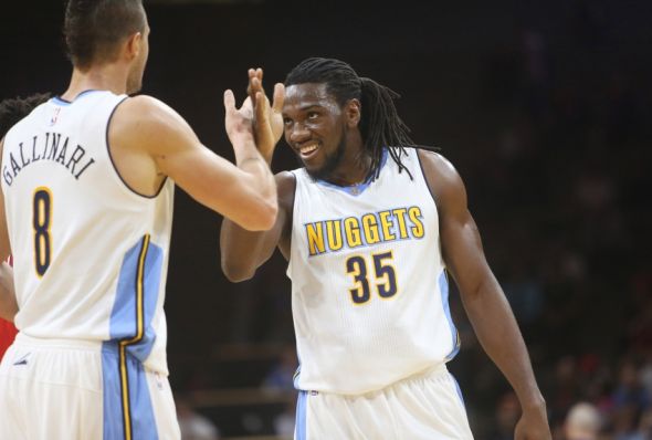 Oct 8, 2015; Boulder, CO, USA; Denver Nuggets forward Kenneth Faried (35) celebrates with forward Danilo Gallinari (8) during the first half against the Chicago Bulls at Coors Events Center. Mandatory Credit: Chris Humphreys-USA TODAY Sports