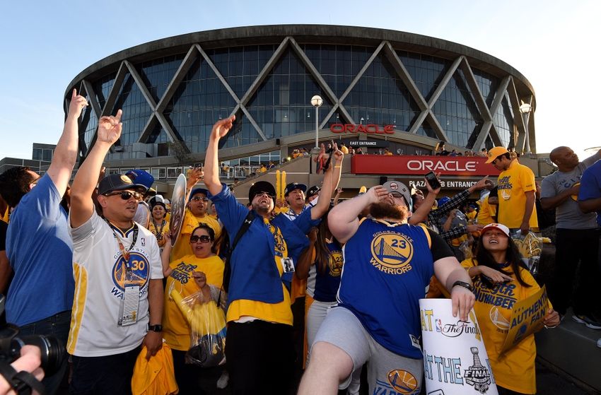 Jun 5, 2016; Oakland, CA, USA; Fans celebrate outside the arena after game two of the NBA Finals between the Golden State Warriors and the Cleveland Cavaliers at Oracle Arena. Mandatory Credit: Kyle Terada-USA TODAY Sports