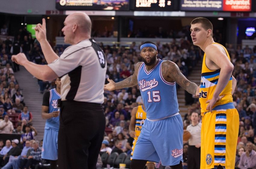 February 19, 2016; Sacramento, CA, USA; Sacramento Kings center DeMarcus Cousins (15) and Denver Nuggets center Nikola Jokic (15, right) react toward NBA referee Gary Zielinski (59) during the third quarter at Sleep Train Arena. The Kings defeated the Nuggets 116-110. Mandatory Credit: Kyle Terada-USA TODAY Sports