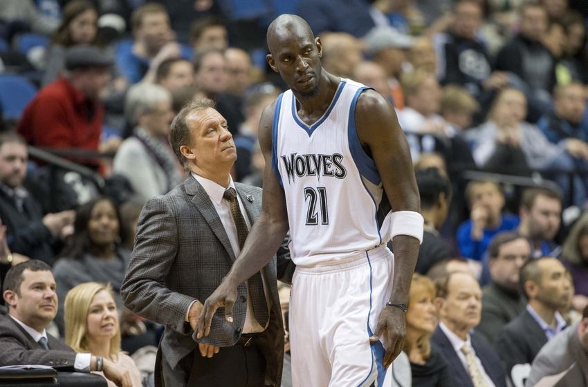 Mar 4, 2015; Minneapolis, MN, USA; Minnesota Timberwolves head coach Flip Saunders and Timberwolves forward Kevin Garnett (21) talk during a timeout in the second half against the Denver Nuggets at Target Center. The Nuggets won 100-85. Mandatory Credit: Jesse Johnson-USA TODAY Sports