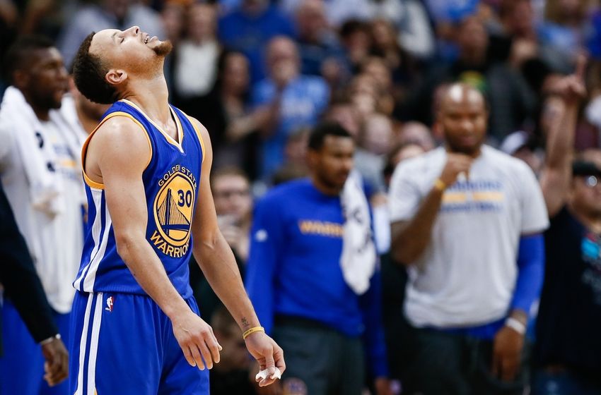 Jan 13, 2016; Denver, CO, USA; Golden State Warriors guard Stephen Curry (30) reacts in the fourth quarter against the Denver Nuggets at the Pepsi Center. The Nuggets defeated the Warriors 112-110. Mandatory Credit: Isaiah J. Downing-USA TODAY Sports