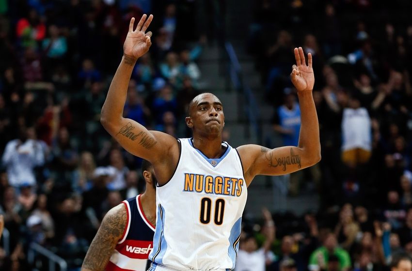 Mar 12, 2016; Denver, CO, USA; Denver Nuggets forward Darrell Arthur (00) celebrates after a play in the fourth quarter against the Washington Wizards at the Pepsi Center. The Nuggets defeated the Wizards 116-100. Mandatory Credit: Isaiah J. Downing-USA TODAY Sports