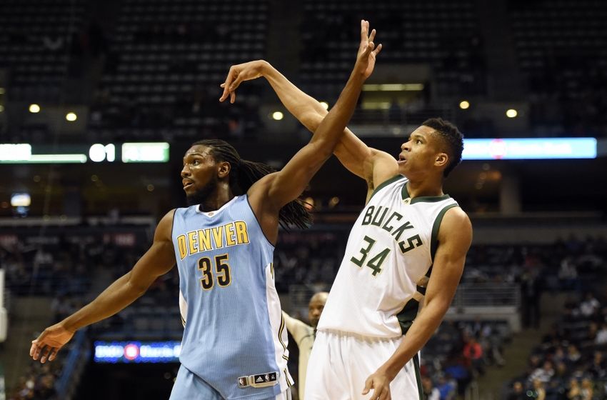 Nov 30, 2015; Milwaukee, WI, USA; Denver Nuggets forward Kenneth Faried (35) watches a shot by Milwaukee Bucks forward Giannis Antetokounmpo (34) in the third quarter at BMO Harris Bradley Center. Mandatory Credit: Benny Sieu-USA TODAY Sports