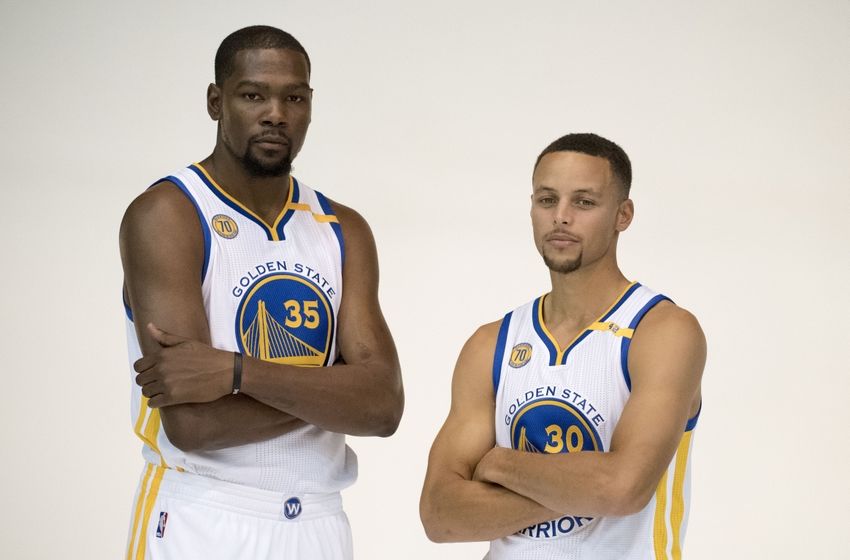 September 26, 2016; Oakland, CA, USA; Golden State Warriors forward Kevin Durant (35) and guard Stephen Curry (30) pose for a photo during media day at the Warriors Practice Facility. Mandatory Credit: Kyle Terada-USA TODAY Sports