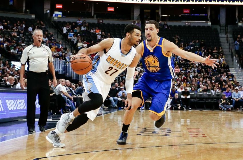 Oct 14, 2016; Denver, CO, USA; Golden State Warriors guard Klay Thompson (11) guards Denver Nuggets guard Jamal Murray (27) in the second quarter at the Pepsi Center. Mandatory Credit: Isaiah J. Downing-USA TODAY Sports