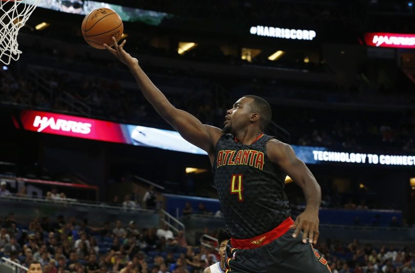 Oct 16, 2016; Orlando, FL, USA; Atlanta Hawks forward Paul Millsap (4) shoots the ball against the Orlando Magic during the second half at Amway Center. The Hawks won 105-98. Mandatory Credit: Kim Klement-USA TODAY Sports