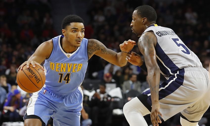 Nov 5, 2016; Auburn Hills, MI, USA; Denver Nuggets guard Gary Harris (14) drives the ball around Detroit Pistons guard Kentavious Caldwell-Pope (5) during the first quarter at The Palace of Auburn Hills. Mandatory Credit: Leon Halip-USA TODAY Sports