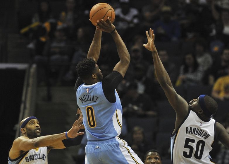Nov 8, 2016; Memphis, TN, USA; Denver Nuggets guard Emmanuel Mudiay (0) shoots the ball over Memphis Grizzlies forward Zach Randolph (50) during the first half at FedExForum. Mandatory Credit: Justin Ford-USA TODAY Sports
