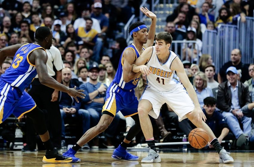 Nov 10, 2016; Denver, CO, USA; Golden State Warriors guard Patrick McCaw (0) guards Denver Nuggets forward Juancho Hernangomez (41) in the third quarter at the Pepsi Center. The Warriors defeated the Nuggets 125-101. Mandatory Credit: Isaiah J. Downing-USA TODAY Sports