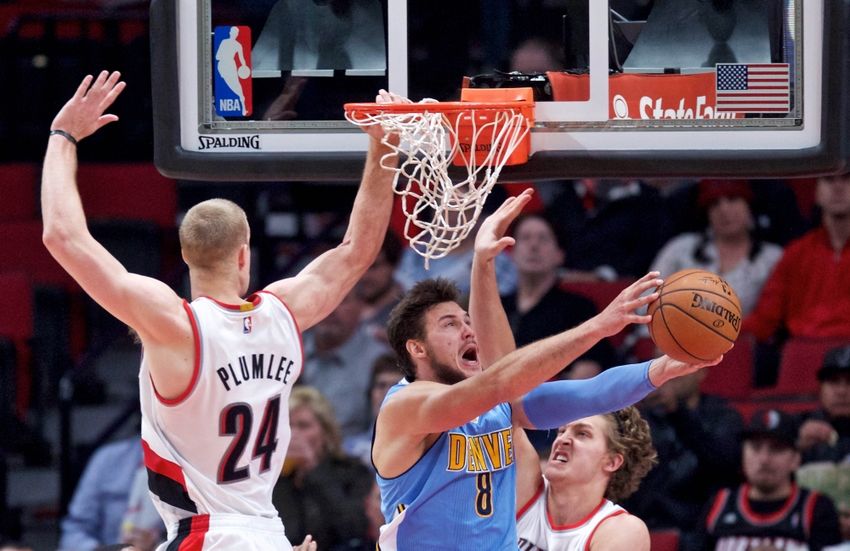 Nov 13, 2016; Portland, OR, USA; Denver Nuggets forward Danilo Gallinari (8) shoots over Portland Trail Blazers forward Mason Plumlee (24) and forward Meyers Leonard (11) during the third quarter at the Moda Center. Mandatory Credit: Craig Mitchelldyer-USA TODAY Sports