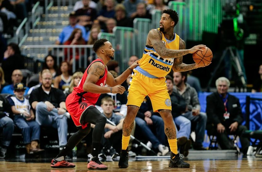 Nov 18, 2016; Denver, CO, USA; Toronto Raptors guard Norman Powell (24) guards Denver Nuggets forward Wilson Chandler (21) in the third quarter at the Pepsi Center. The Raptors won 113-111 in overtime. Mandatory Credit: Isaiah J. Downing-USA TODAY Sports