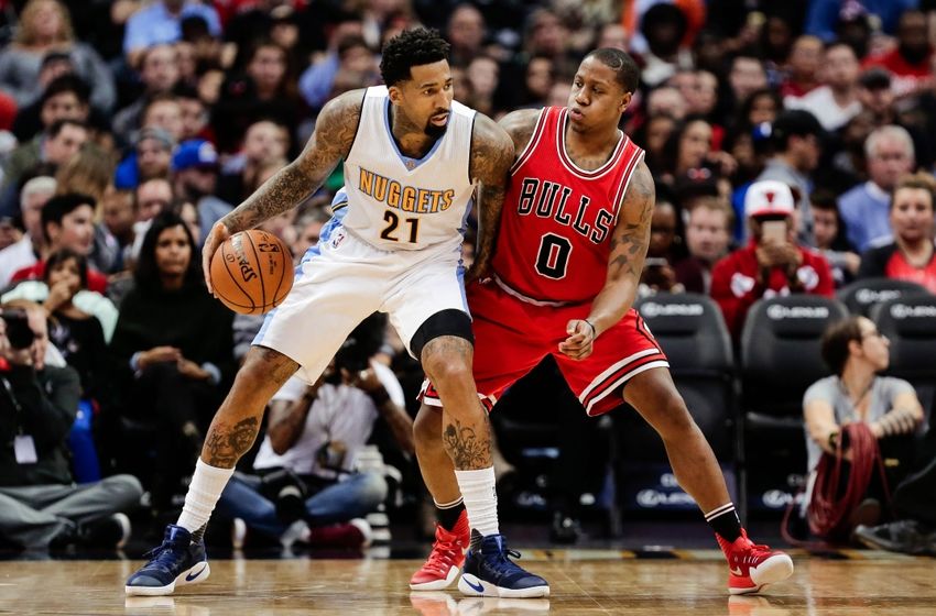 Nov 22, 2016; Denver, CO, USA; Chicago Bulls guard Isaiah Canaan (0) guards Denver Nuggets forward Wilson Chandler (21) in the third quarter at the Pepsi Center. The Nuggets defeated the Bulls 110-107. Mandatory Credit: Isaiah J. Downing-USA TODAY Sports