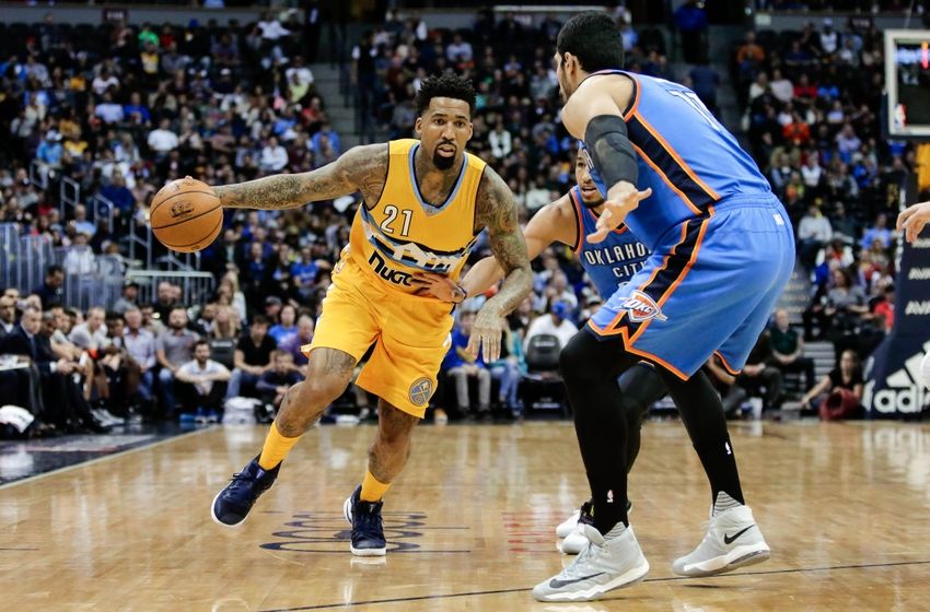 Nov 25, 2016; Denver, CO, USA; Denver Nuggets forward Wilson Chandler (21) drives to the basket against Oklahoma City Thunder center Enes Kanter (11) in the second quarter at the Pepsi Center. Mandatory Credit: Isaiah J. Downing-USA TODAY Sports