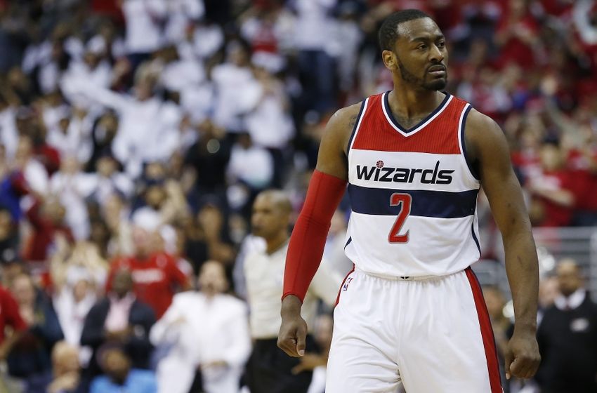 Apr 24, 2015; Washington, DC, USA; Washington Wizards guard John Wall (2) reacts on the court against the Toronto Raptors in the second quarter in game three of the first round of the NBA Playoffs at Verizon Center. Mandatory Credit: Geoff Burke-USA TODAY Sports