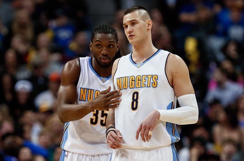 Feb 23, 2016; Denver, CO, USA; Denver Nuggets forward Kenneth Faried (35) talks with forward Danilo Gallinari (8) in the second quarter against the Sacramento Kings at Pepsi Center. Mandatory Credit: Isaiah J. Downing-USA TODAY Sports