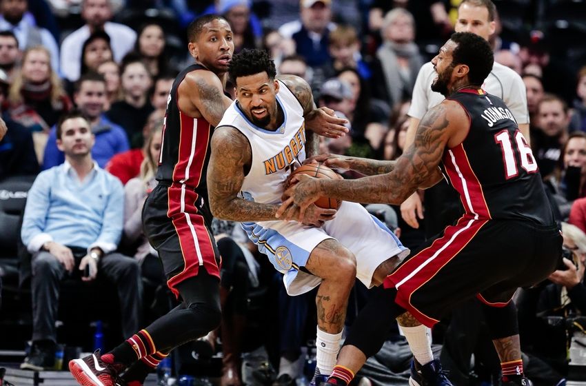 Nov 30, 2016; Denver, CO, USA; Denver Nuggets forward Wilson Chandler (21) battles for the ball with Miami Heat guard Rodney McGruder (17) and forward James Johnson (16) in the fourth quarter at the Pepsi Center. The Heat won 106-98. Mandatory Credit: Isaiah J. Downing-USA TODAY Sports