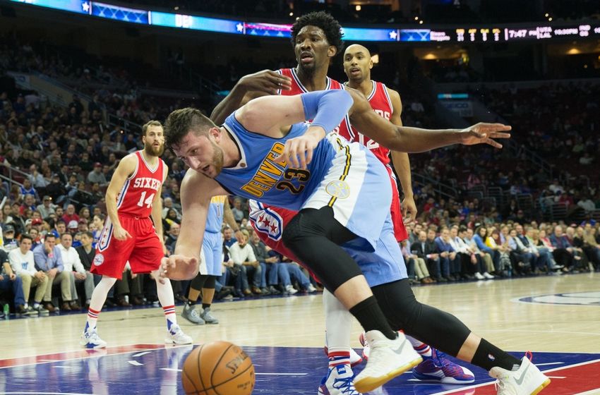 fDec 5, 2016; Philadelphia, PA, USA; Denver Nuggets center Jusuf Nurkic (23) loses control of the ball after being fouled by Philadelphia 76ers center Joel Embiid (21) during the second quarter at Wells Fargo Center. Mandatory Credit: Bill Streicher-USA TODAY Sports