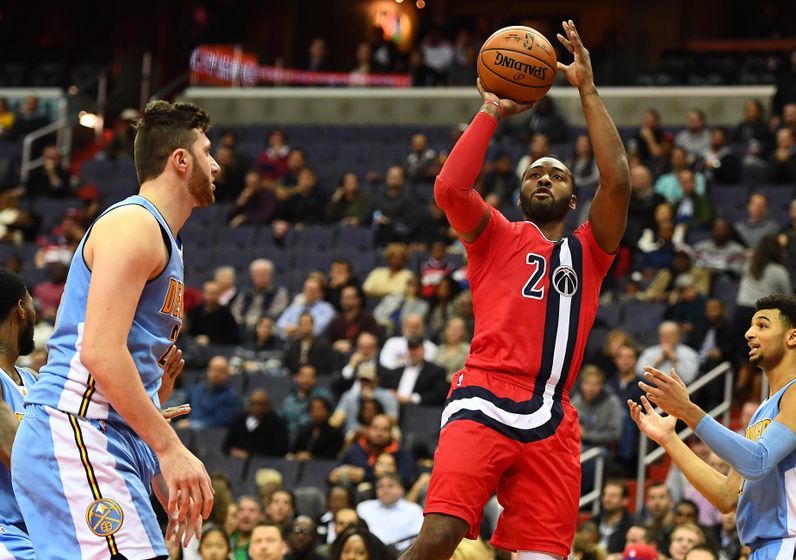 Dec 8, 2016; Washington, DC, USA; Washington Wizards guard John Wall (2) attempts a shot against the Denver Nuggets during the second half at Verizon Center. The Washington Wizards won 92-85. Mandatory Credit: Brad Mills-USA TODAY Sports
