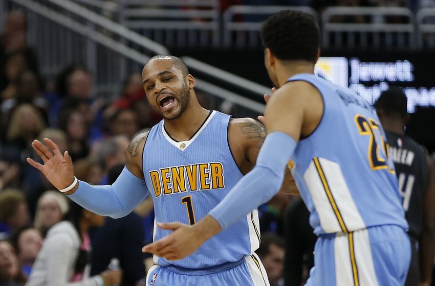 Dec 10, 2016; Orlando, FL, USA; Denver Nuggets guard Jameer Nelson (1) and Denver Nuggets guard Jamal Murray (27) talk about coverage issues during the second half of an NBA basketball game against the Orlando Magic at Amway Center. The Nuggets won 121-113. Mandatory Credit: Reinhold Matay-USA TODAY Sports