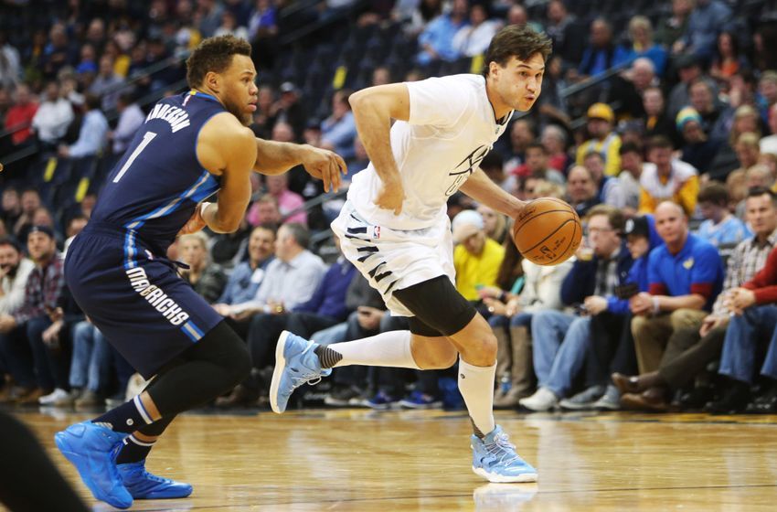 Dec 19, 2016; Denver, CO, USA; Denver Nuggets forward Danilo Gallinari (8) drives to the basket against Dallas Mavericks guard Justin Anderson (1) during the first half at Pepsi Center. Mandatory Credit: Chris Humphreys-USA TODAY Sports
