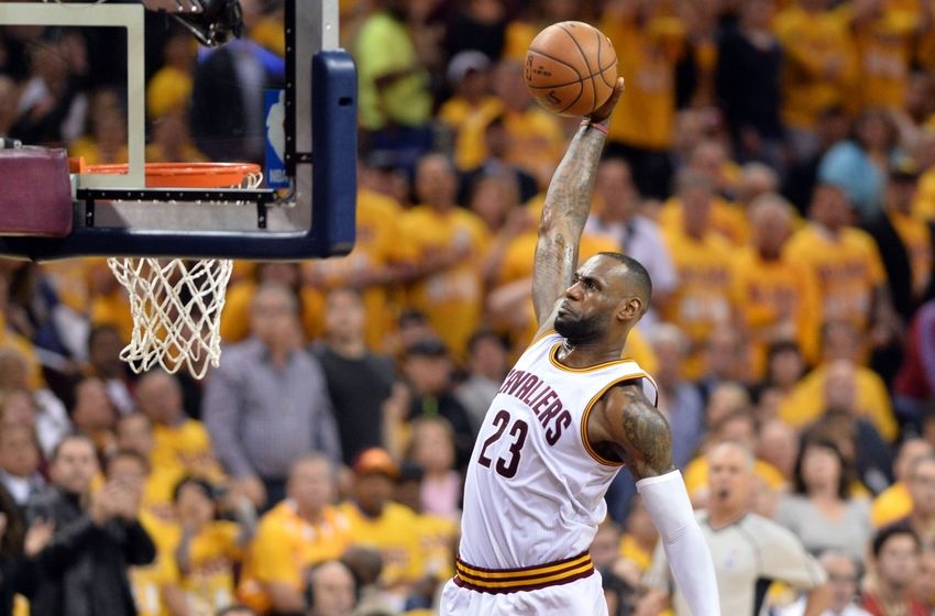 May 17, 2016; Cleveland, OH, USA; Cleveland Cavaliers forward LeBron James (23) slam dunks during the third quarter against the Toronto Raptors in game one of the Eastern conference finals of the NBA Playoffs at Quicken Loans Arena. The Cavs won 115-84. Mandatory Credit: Ken Blaze-USA TODAY Sports