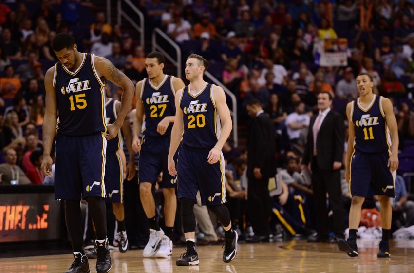 Feb 6, 2015; Phoenix, AZ, USA; Utah Jazz forward Derrick Favors (15) and center Rudy Gobert (27) and forward Gordon Hayward (20) and guard Dante Exum (11) look on against the Phoenix Suns at US Airways Center. Mandatory Credit: Joe Camporeale-USA TODAY Sports