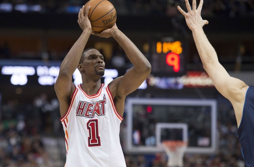 Feb 3, 2016; Dallas, TX, USA; Miami Heat forward Chris Bosh (1) makes a jump shot against the Dallas Mavericks during the second half at the American Airlines Center. The Heat defeat the Mavericks 93-90. Mandatory Credit: Jerome Miron-USA TODAY Sports