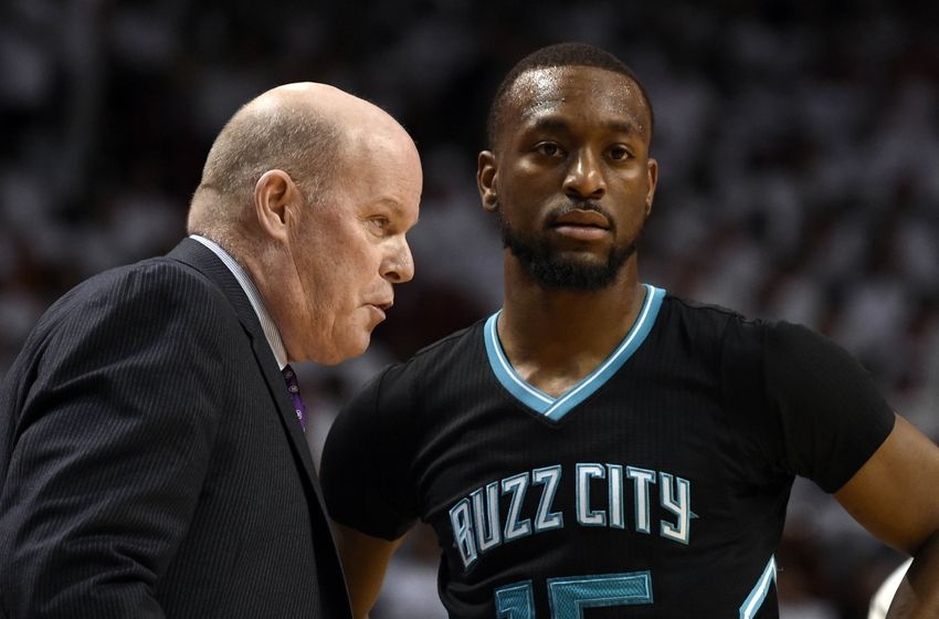 May 1, 2016; Miami, FL, USA; Charlotte Hornets head coach Steve Clifford (left) listens to Hornets guard Kemba Walker (right) during the second half in game seven of the first round of the NBA Playoffs against the Miami Heat at American Airlines Arena. The Heat won 106-73. Mandatory Credit: Steve Mitchell-USA TODAY Sports